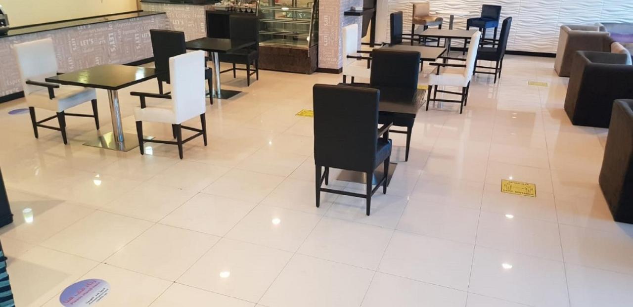 Tulip Hotel & Suites Manamah Buitenkant foto