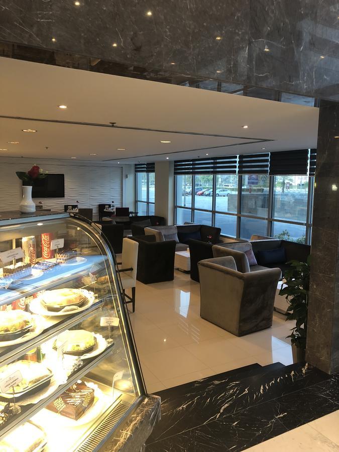 Tulip Hotel & Suites Manamah Buitenkant foto